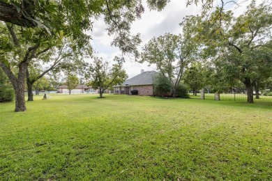 One owner custom built home with tons of recent updates located on Pecan Plantation Country Club in Texas - for sale on GolfHomes.com, golf home, golf lot