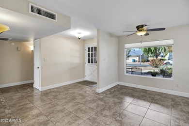 Perfectly positioned on the 12th hole of Ahwatukee Golf Club on Ahwatukee Country Club in Arizona - for sale on GolfHomes.com, golf home, golf lot