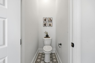 Stunning lakefront curb appeal meets timeless character in this on Myrtlewood Golf Course and Club  in South Carolina - for sale on GolfHomes.com, golf home, golf lot