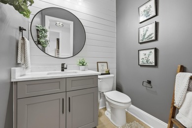 Stunning lakefront curb appeal meets timeless character in this on Myrtlewood Golf Course and Club  in South Carolina - for sale on GolfHomes.com, golf home, golf lot