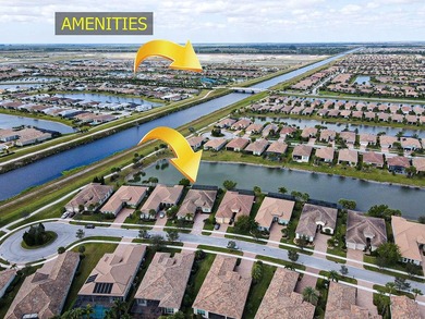 Stunning PGA Verano Pool Home with expansive water views. The on PGA Golf Club in PGA Village in Florida - for sale on GolfHomes.com, golf home, golf lot