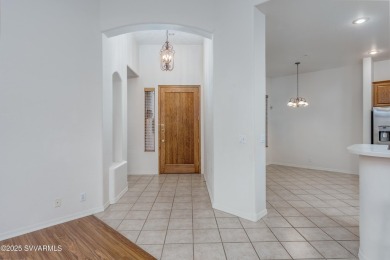 Single-level townhome, backing to open space, green belt, and on Canyon Mesa Country Club in Arizona - for sale on GolfHomes.com, golf home, golf lot