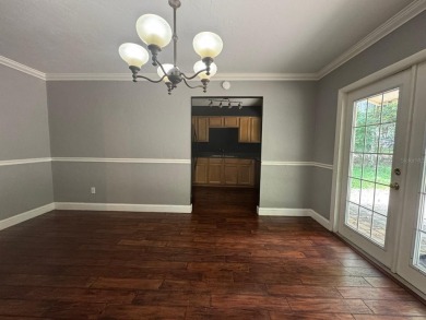 Welcome to your dream home in sought-after Golfview on Mark Bostick Golf Course At University of Florida in Florida - for sale on GolfHomes.com, golf home, golf lot
