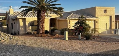 This centrally located 3-bedroom 3-bathroom home is only minutes on London Bridge Golf Course in Arizona - for sale on GolfHomes.com, golf home, golf lot