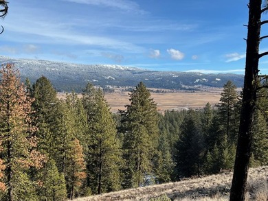 Top of the World views of scenic Meadows Valley, perched on the on Meadowcreek Golf Resort in Idaho - for sale on GolfHomes.com, golf home, golf lot