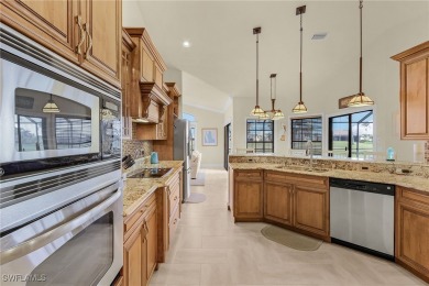 This home flows with charm, sunlight and lake views with privacy on Royal Tee Country Club in Florida - for sale on GolfHomes.com, golf home, golf lot