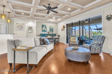 Experience the pinnacle of coastal living in this custom-built on Magnolia Greens Golf Plantation in North Carolina - for sale on GolfHomes.com, golf home, golf lot