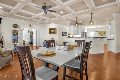 Experience the pinnacle of coastal living in this custom-built on Magnolia Greens Golf Plantation in North Carolina - for sale on GolfHomes.com, golf home, golf lot