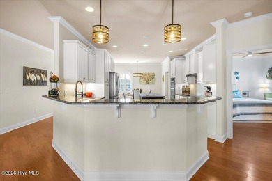 Experience the pinnacle of coastal living in this custom-built on Magnolia Greens Golf Plantation in North Carolina - for sale on GolfHomes.com, golf home, golf lot