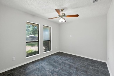 4-Bedroom 3 Full Bathroom Home in an Amenity-Rich Gated on Pecan Plantation Country Club in Texas - for sale on GolfHomes.com, golf home, golf lot