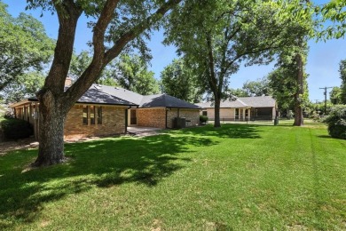 4-Bedroom 3 Full Bathroom Home in an Amenity-Rich Gated on Pecan Plantation Country Club in Texas - for sale on GolfHomes.com, golf home, golf lot