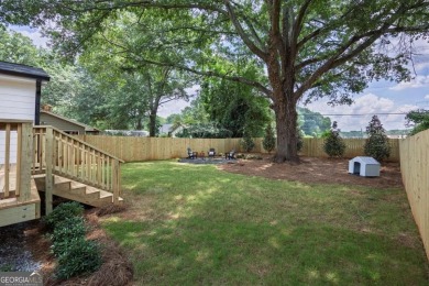 Step into this absolutely stunning, fully renovated home in the on East Lake Golf Club in Georgia - for sale on GolfHomes.com, golf home, golf lot
