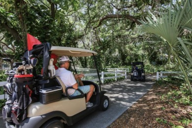 Lovely location on a cul-de-sac of swaying palms, Papillon on The Meadows Golf and Country Club in Florida - for sale on GolfHomes.com, golf home, golf lot