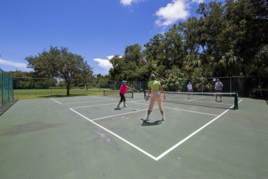 Lovely location on a cul-de-sac of swaying palms, Papillon on The Meadows Golf and Country Club in Florida - for sale on GolfHomes.com, golf home, golf lot