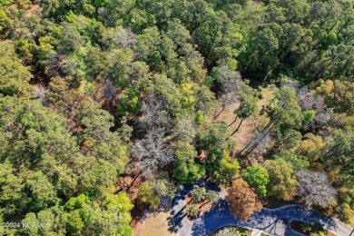 Beautiful Wooded Homesite less than 5 miles from Holden Beach on Lockwood Folly Country Club in North Carolina - for sale on GolfHomes.com, golf home, golf lot