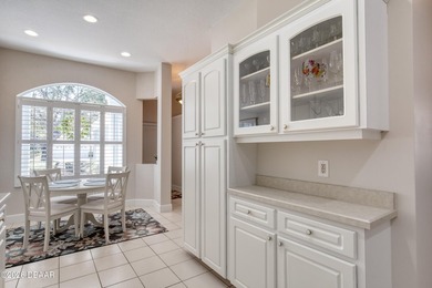 Located in the Halifax Plantation community, this 3-bedroom on Halifax Plantation Golf Club in Florida - for sale on GolfHomes.com, golf home, golf lot