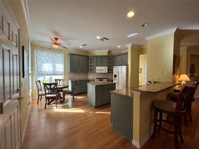 Move-in ready and beautifully furnished! No Bond! This one-owner on Arlington Ridge Golf Club in Florida - for sale on GolfHomes.com, golf home, golf lot