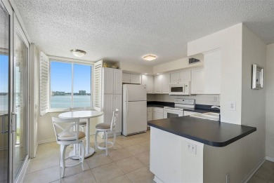 You'll be captivated the moment you step through the door of on Isla Del Sol Yacht and Country Club in Florida - for sale on GolfHomes.com, golf home, golf lot