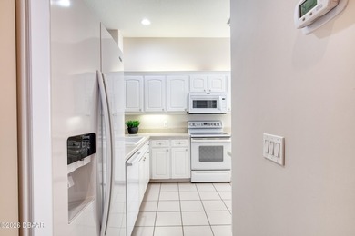 Located in the Halifax Plantation community, this 3-bedroom on Halifax Plantation Golf Club in Florida - for sale on GolfHomes.com, golf home, golf lot