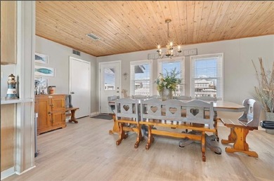 WATERFRONT ISLAND DREAM IN AN AMAZING LOCATION! Home has approx on Isle Dauphine Club Golf Course in Alabama - for sale on GolfHomes.com, golf home, golf lot