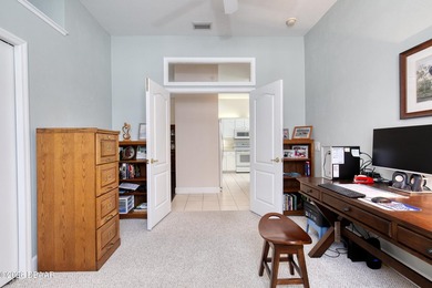 Located in the Halifax Plantation community, this 3-bedroom on Halifax Plantation Golf Club in Florida - for sale on GolfHomes.com, golf home, golf lot