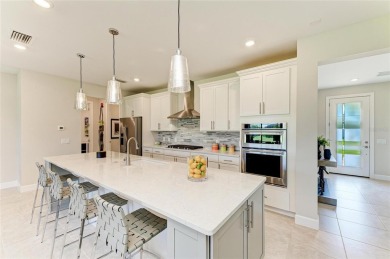 Nestled in the heart of Del Webb at Lakewood Ranch. A premier on The Concession Golf Club in Florida - for sale on GolfHomes.com, golf home, golf lot