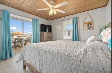 WATERFRONT ISLAND DREAM IN AN AMAZING LOCATION! Home has approx on Isle Dauphine Club Golf Course in AL - for sale on GolfHomes.com, golf home, golf lot