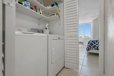 You'll be captivated the moment you step through the door of on Isla Del Sol Yacht and Country Club in Florida - for sale on GolfHomes.com, golf home, golf lot