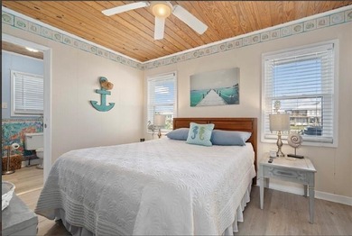 WATERFRONT ISLAND DREAM IN AN AMAZING LOCATION! Home has approx on Isle Dauphine Club Golf Course in AL - for sale on GolfHomes.com, golf home, golf lot