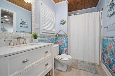 WATERFRONT ISLAND DREAM IN AN AMAZING LOCATION! Home has approx on Isle Dauphine Club Golf Course in AL - for sale on GolfHomes.com, golf home, golf lot