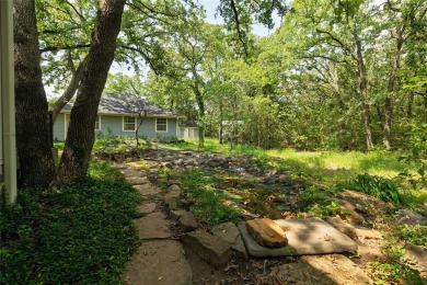Welcome to your own private retreat at 331 County Road 3418 in on Bridgeport Country Club in Texas - for sale on GolfHomes.com, golf home, golf lot