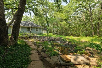 Welcome to your own private retreat at 331 County Road 3418 in on Bridgeport Country Club in Texas - for sale on GolfHomes.com, golf home, golf lot