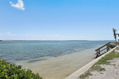 You'll be captivated the moment you step through the door of on Isla Del Sol Yacht and Country Club in Florida - for sale on GolfHomes.com, golf home, golf lot