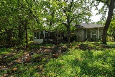 Welcome to your own private retreat at 331 County Road 3418 in on Bridgeport Country Club in Texas - for sale on GolfHomes.com, golf home, golf lot