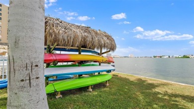 You'll be captivated the moment you step through the door of on Isla Del Sol Yacht and Country Club in Florida - for sale on GolfHomes.com, golf home, golf lot
