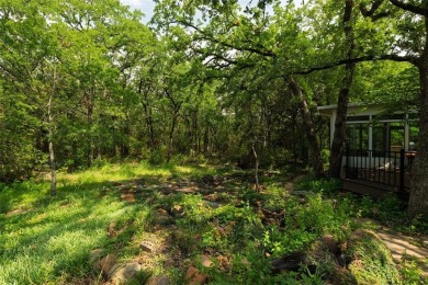 Welcome to your own private retreat at 331 County Road 3418 in on Bridgeport Country Club in Texas - for sale on GolfHomes.com, golf home, golf lot