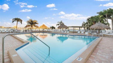 You'll be captivated the moment you step through the door of on Isla Del Sol Yacht and Country Club in Florida - for sale on GolfHomes.com, golf home, golf lot