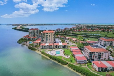 You'll be captivated the moment you step through the door of on Isla Del Sol Yacht and Country Club in Florida - for sale on GolfHomes.com, golf home, golf lot