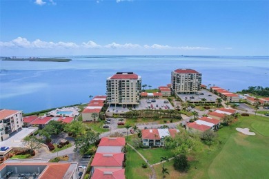 You'll be captivated the moment you step through the door of on Isla Del Sol Yacht and Country Club in Florida - for sale on GolfHomes.com, golf home, golf lot