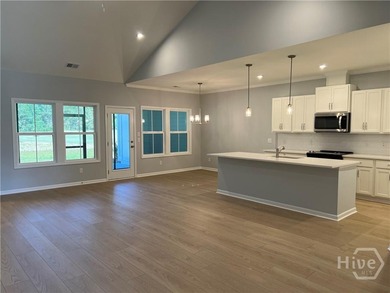 ***COUNTDOWN TO CLOSE-OUT***This newly constructed end-unit home on Savannah Quarters Country Club in Georgia - for sale on GolfHomes.com, golf home, golf lot