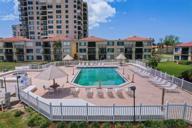 You'll be captivated the moment you step through the door of on Isla Del Sol Yacht and Country Club in Florida - for sale on GolfHomes.com, golf home, golf lot
