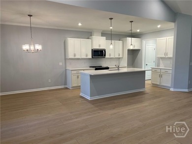 ***COUNTDOWN TO CLOSE-OUT***This newly constructed end-unit home on Savannah Quarters Country Club in Georgia - for sale on GolfHomes.com, golf home, golf lot