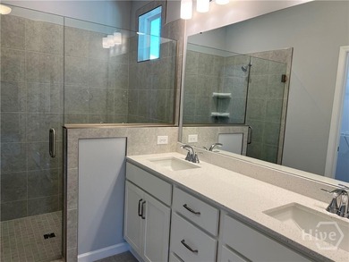 ***COUNTDOWN TO CLOSE-OUT***This newly constructed end-unit home on Savannah Quarters Country Club in Georgia - for sale on GolfHomes.com, golf home, golf lot