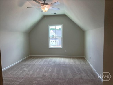 ***COUNTDOWN TO CLOSE-OUT***This newly constructed end-unit home on Savannah Quarters Country Club in Georgia - for sale on GolfHomes.com, golf home, golf lot