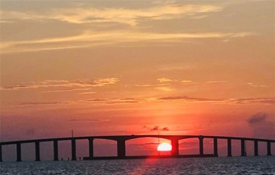 WATERFRONT ISLAND DREAM IN AN AMAZING LOCATION! Home has approx on Isle Dauphine Club Golf Course in AL - for sale on GolfHomes.com, golf home, golf lot