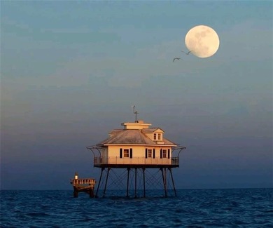 WATERFRONT ISLAND DREAM IN AN AMAZING LOCATION! Home has approx on Isle Dauphine Club Golf Course in AL - for sale on GolfHomes.com, golf home, golf lot