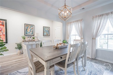 Move In Ready - More for your Money! The Kensington Plan with on Savannah Quarters Country Club in Georgia - for sale on GolfHomes.com, golf home, golf lot