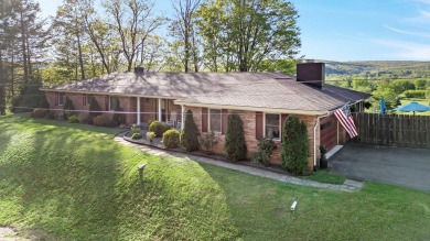 Perched on a hilltop overlooking a breathtaking scenic view of on Port Jervis Country Club in New York - for sale on GolfHomes.com, golf home, golf lot