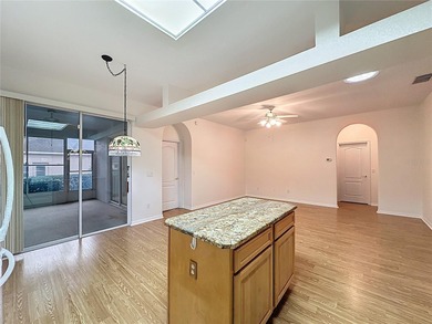 Home is a  St Andrews model located on a corner lot. A paver on Kings Ridge Golf Club in Florida - for sale on GolfHomes.com, golf home, golf lot