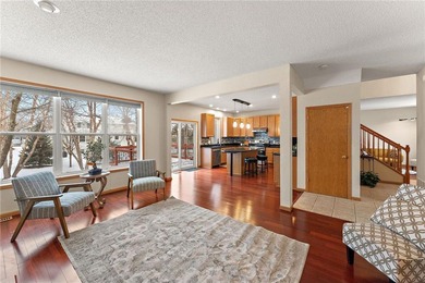 Sun-filled and magnificent, this impressive two-story on Eagle Valley Golf Course in Minnesota - for sale on GolfHomes.com, golf home, golf lot